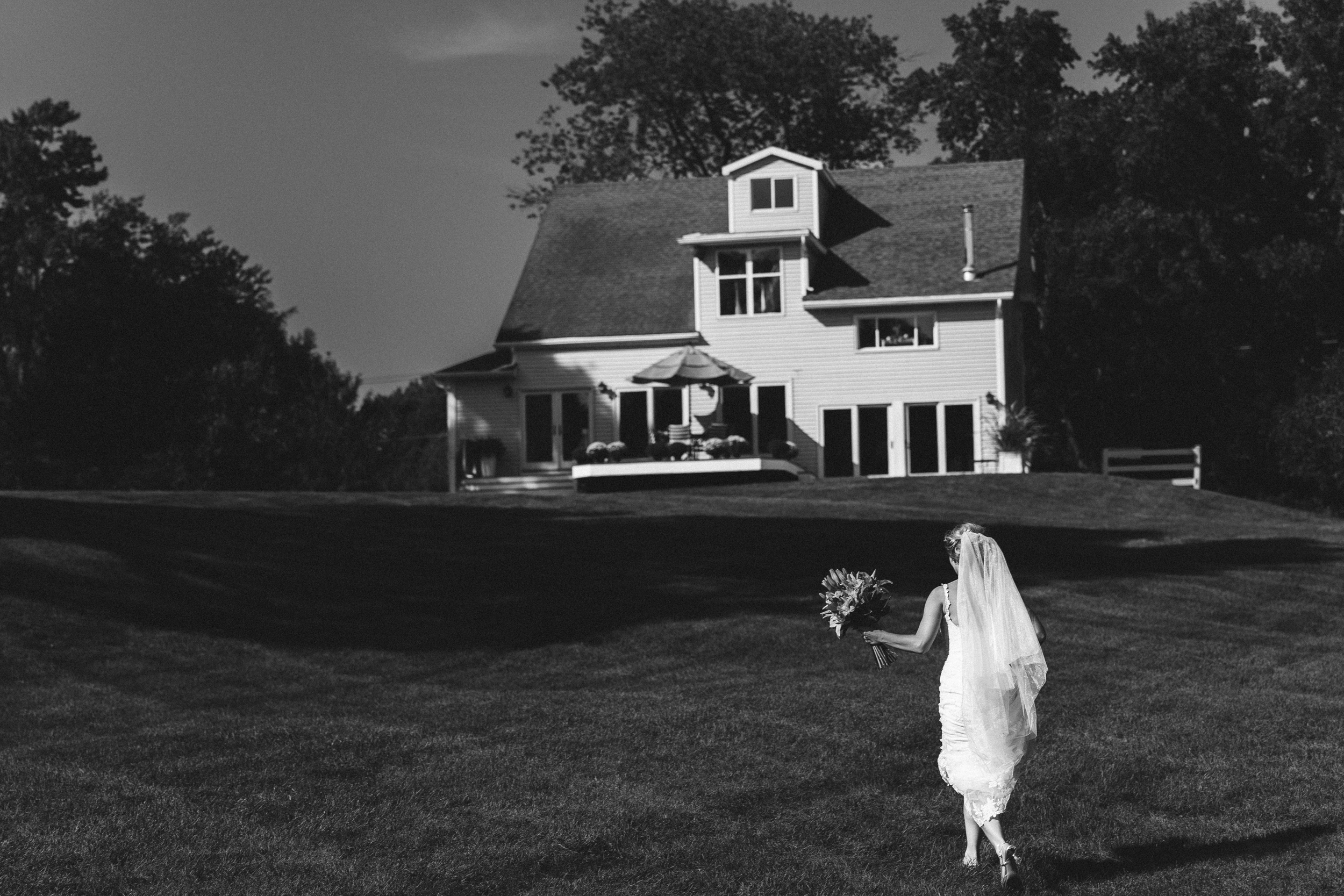 The bride runs into her grandparents house so the groom won't see her before their wedding ceremony in Saratoga NY