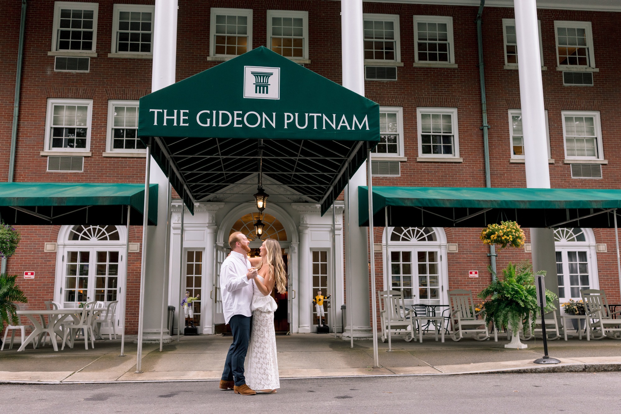 couple slow dance during their engagement photos at the gideon putnam